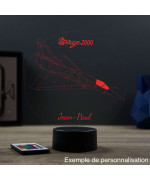 Lampe illusion 3D en verre acrylique gravée au laser représentant un avion de chasse Mirage 2000C.