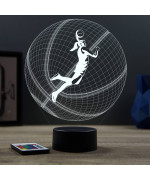 Lampe illusion 3D en verre acrylique gravée au laser représentant une basketteuse à l'intérieur d'un ballon de basket.