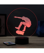 Lampe illusion 3D en verre acrylique gravée au laser représentant un rider en train de faire du skateboard.
