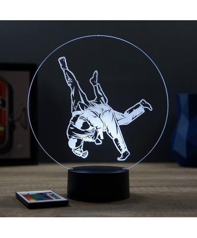 Lampe illusion 3D en verre acrylique gravée au laser représentant deux combattants de judo .