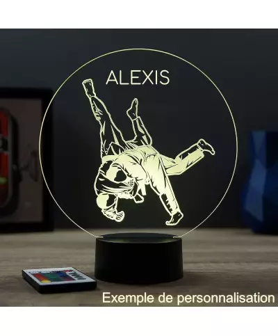 Lampe illusion 3D en verre acrylique gravée au laser représentant deux combattants de judo .