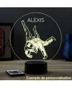 Lampe illusion 3D en verre acrylique gravée au laser représentant deux combattants de judo .