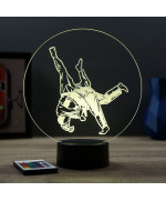 Lampe illusion 3D en verre acrylique gravée au laser représentant deux combattants de judo .