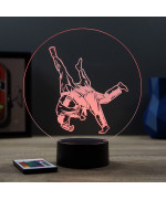 Lampe illusion 3D en verre acrylique gravée au laser représentant deux combattants de judo .