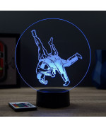 Lampe illusion 3D en verre acrylique gravée au laser représentant deux combattants de judo .