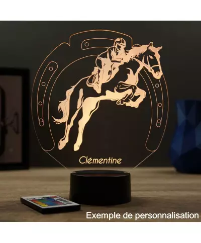 Lampe illusion 3D en verre acrylique gravée au laser représentant un cavalier sur son cheval qui saute.