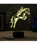 Lampe illusion 3D en verre acrylique gravée au laser représentant un cavalier sur son cheval qui saute.