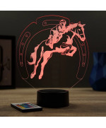 Lampe illusion 3D en verre acrylique gravée au laser représentant un cavalier sur son cheval qui saute.