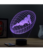 Lampe illusion 3D en verre acrylique gravée au laser représentant un joueur de rugby à l'intérieur d'un ballon.