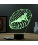 Lampe illusion 3D en verre acrylique gravée au laser représentant un joueur de rugby à l'intérieur d'un ballon.