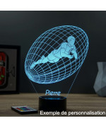Lampe illusion 3D en verre acrylique gravée au laser représentant un joueur de rugby à l'intérieur d'un ballon.