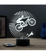 Lampe illusion 3D en verre acrylique gravée au laser représentant un cycliste sur son VTT.