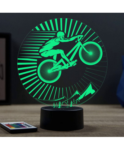 Lampe illusion 3D en verre acrylique gravée au laser représentant un cycliste sur son VTT.