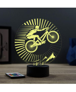 Lampe illusion 3D en verre acrylique gravée au laser représentant un cycliste sur son VTT.