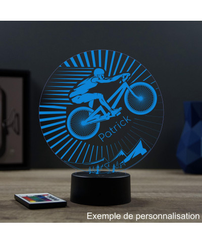 Lampe illusion 3D en verre acrylique gravée au laser représentant un cycliste sur son VTT.
