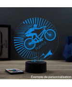 Lampe illusion 3D en verre acrylique gravée au laser représentant un cycliste sur son VTT.