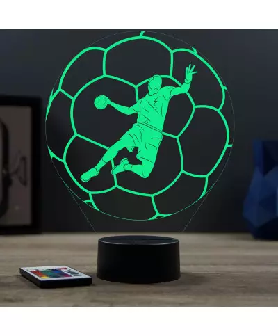Lampe illusion 3D en verre acrylique gravée au laser représentant un joueur de Handball à l'intérieur d'un ballon.