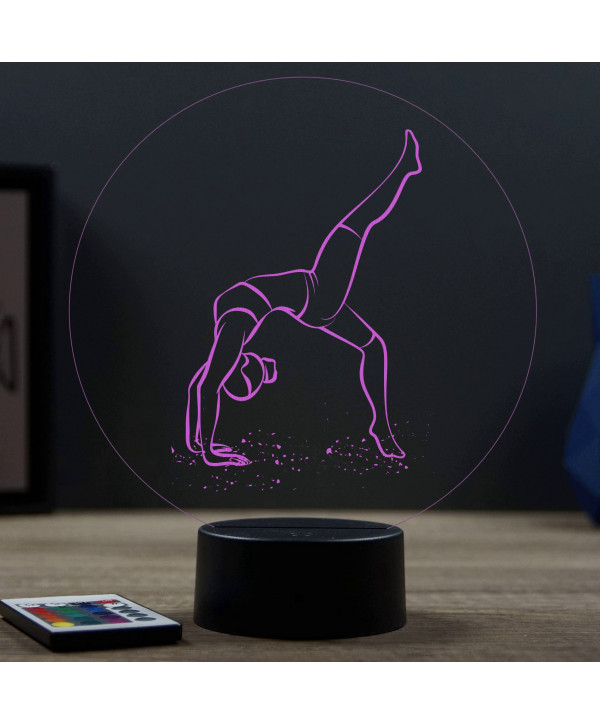 Lampe illusion 3D en verre acrylique gravée au laser représentant une gymnaste.