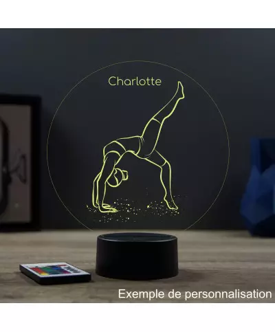 Lampe illusion 3D en verre acrylique gravée au laser représentant une gymnaste.