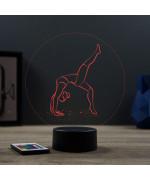 Lampe illusion 3D en verre acrylique gravée au laser représentant une gymnaste.