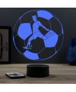 Lampe illusion 3D en verre acrylique gravée au laser représentant un joueur de foot à l'intérieur d'un ballon.