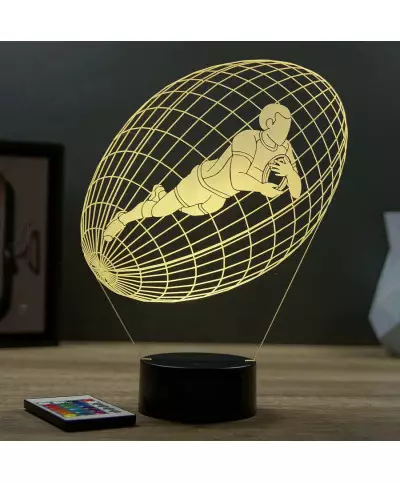 Lampe illusion 3D en verre acrylique gravée au laser représentant un joueur de rugby à l'intérieur d'un ballon.