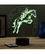 Lampe illusion 3D en verre acrylique gravée au laser représentant un cavalier sur son cheval qui saute.