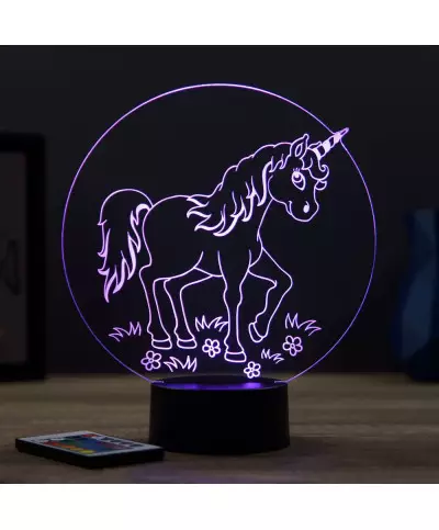 Lampe illusion 3D en verre acrylique gravée au laser représentant une licorne entourée de fleurs.