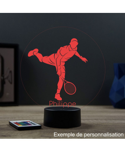 Lampe illusion 3D en verre acrylique gravée au laser représentant un joueur de tennis à l'intérieur d'une balle de tennis.
