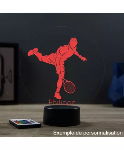 Lampe illusion 3D en verre acrylique gravée au laser représentant un joueur de tennis à l'intérieur d'une balle de tennis.