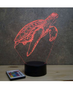 Lampe illusion 3D en verre acrylique gravée au laser représentant une tortue marine qui nage.