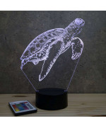 Lampe illusion 3D en verre acrylique gravée au laser représentant une tortue marine qui nage.