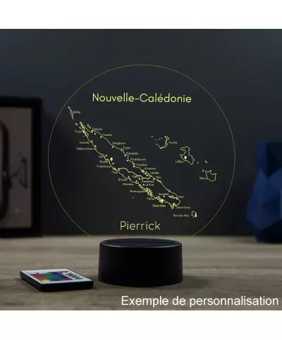 Lampe illusion 3D en verre acrylique gravée au laser représentant une carte de l'île de la Nouvelle Calédonie.