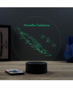 Lampe illusion 3D en verre acrylique gravée au laser représentant une carte de l'île de la Nouvelle Calédonie.