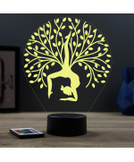 Lampe illusion 3D en verre acrylique gravée au laser représentant une femme faisant du yoga sous un arbre de vie.