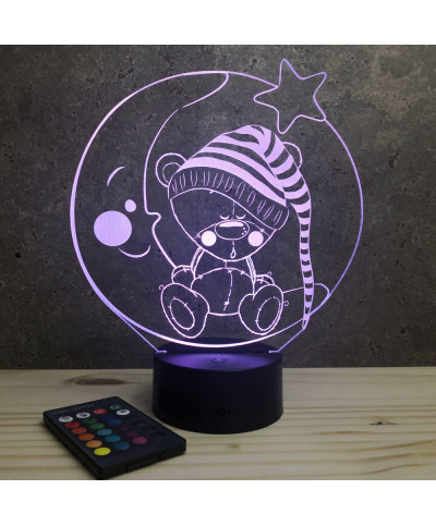 Lampe illusion 3D en verre acrylique gravée au laser représentant un nounours assis sur un croissant de lune.