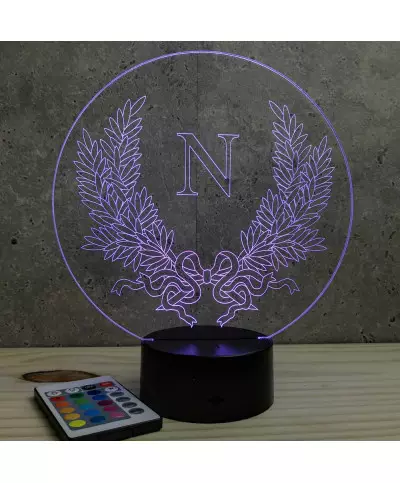 Lampe illusion 3D en verre acrylique gravée au laser représentant l'emblème de l'empereur Napoléon.