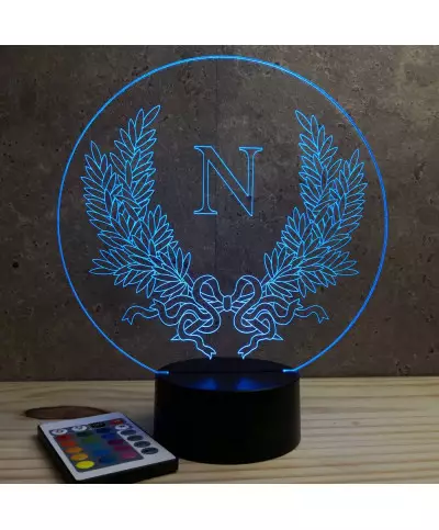 Lampe illusion 3D en verre acrylique gravée au laser représentant l'emblème de l'empereur Napoléon.