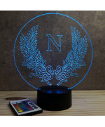 Lampe illusion 3D en verre acrylique gravée au laser représentant l'emblème de l'empereur Napoléon.