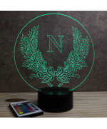 Lampe illusion 3D en verre acrylique gravée au laser représentant l'emblème de l'empereur Napoléon.