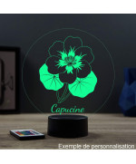 Lampe illusion 3D en verre acrylique gravée au laser représentant une fleur de Capucine.