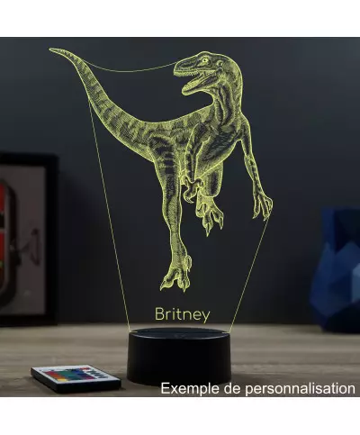 Lampe illusion 3D en verre acrylique gravée au laser représentant un Dinosaure Velociraptor.