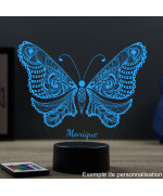 Lampe illusion 3D en verre acrylique gravée au laser représentant un papillon.