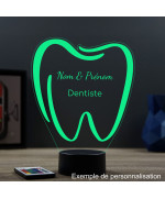 Lampe illusion 3D en verre acrylique gravée au laser représentant une dent molaire.