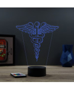 Lampe illusion 3D en verre acrylique gravée au laser représentant l'emblème du caducée.