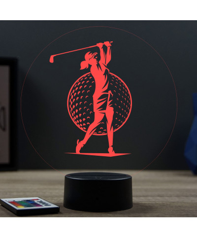 Lampe illusion 3D en verre acrylique gravée au laser représentant une Golfeuse jouant au golf.