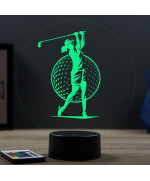 Lampe illusion 3D en verre acrylique gravée au laser représentant une Golfeuse jouant au golf.