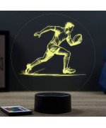 Lampe illusion 3D en verre acrylique gravée au laser représentant un rugbyman.