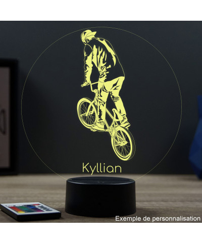 Lampe illusion 3D en verre acrylique gravée au laser représentant un bicrosseur.