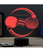 Lampe illusion 3D en verre acrylique gravée au laser représentant des raquettes de ping pong.